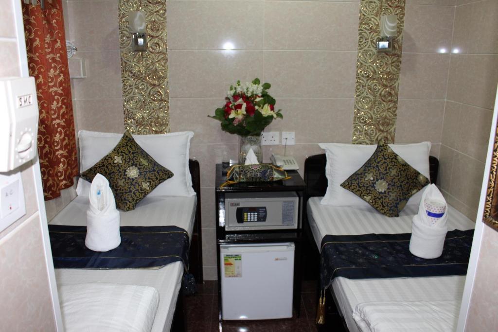 Двухместный (Двухместный номер Делюкс с 2 отдельными кроватями), Hong Kong Premium Guest House
