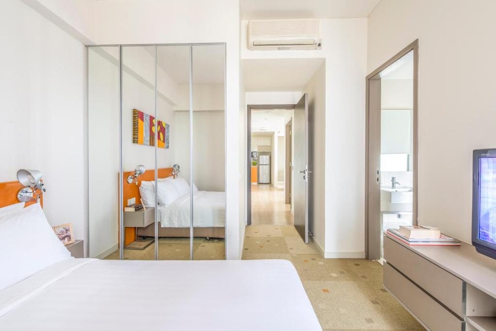 Двухместный (Представительские апартаменты с 2 спальнями), Citadines Mount Sophia Singapore