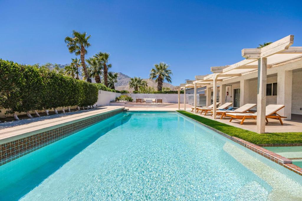 Spacious home with pool, fireplace, outdoor deck image