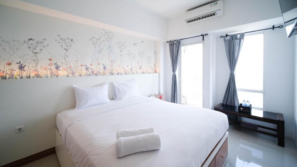 Nice and Comfy Studio at Orchard Supermall Mansion Apartment By Travelio