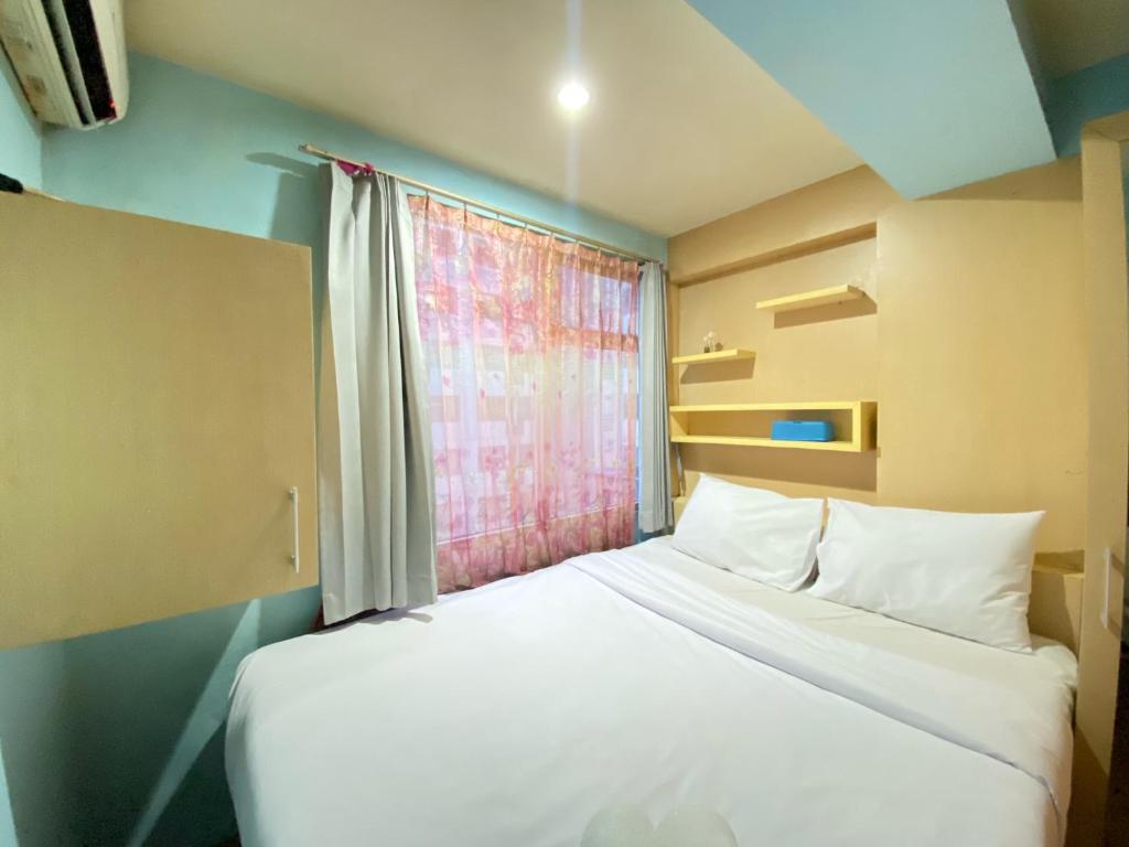 Homey Living 2BR at Jarrdin Cihampelas Apartment By Travelio, Bandung