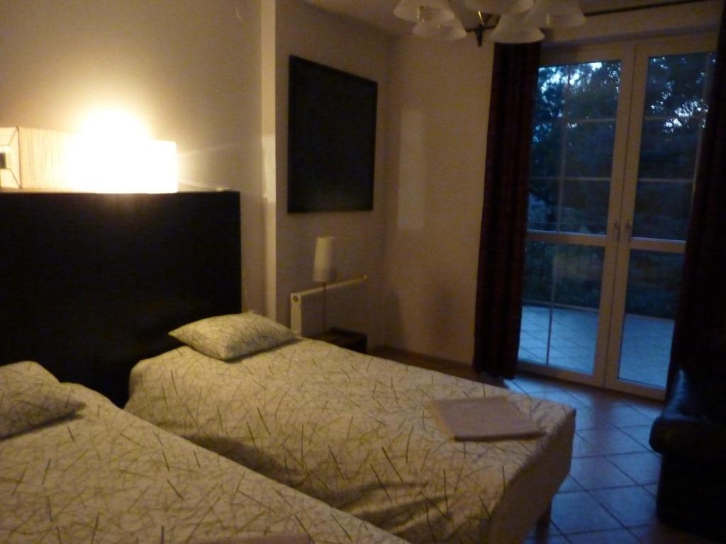 Номер (Односпальная кровать в общем номере для мужчин и женщин), Dandelion B&B
