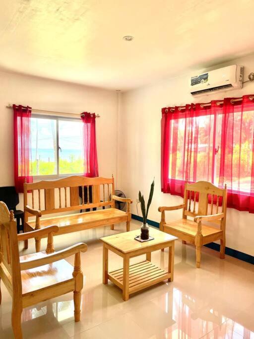 Alma Guesthouse with beach view and sunset - Tap to explore photos