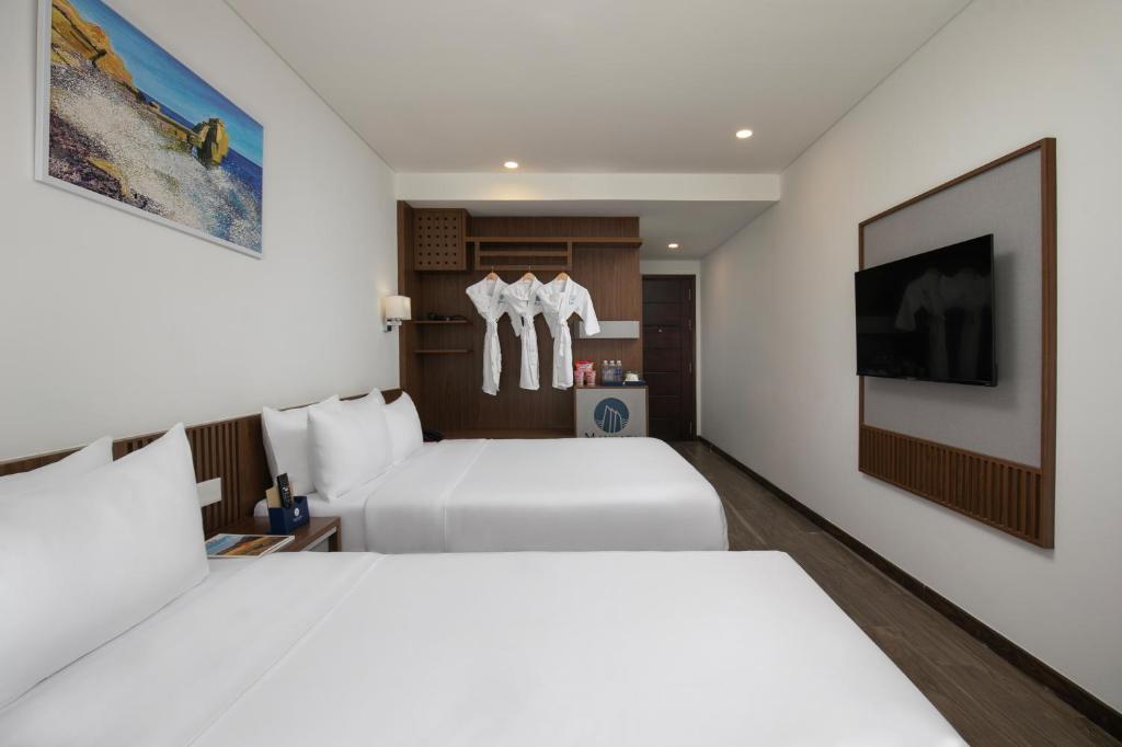 Mangata Beachfront Hotel - Tap to explore photos