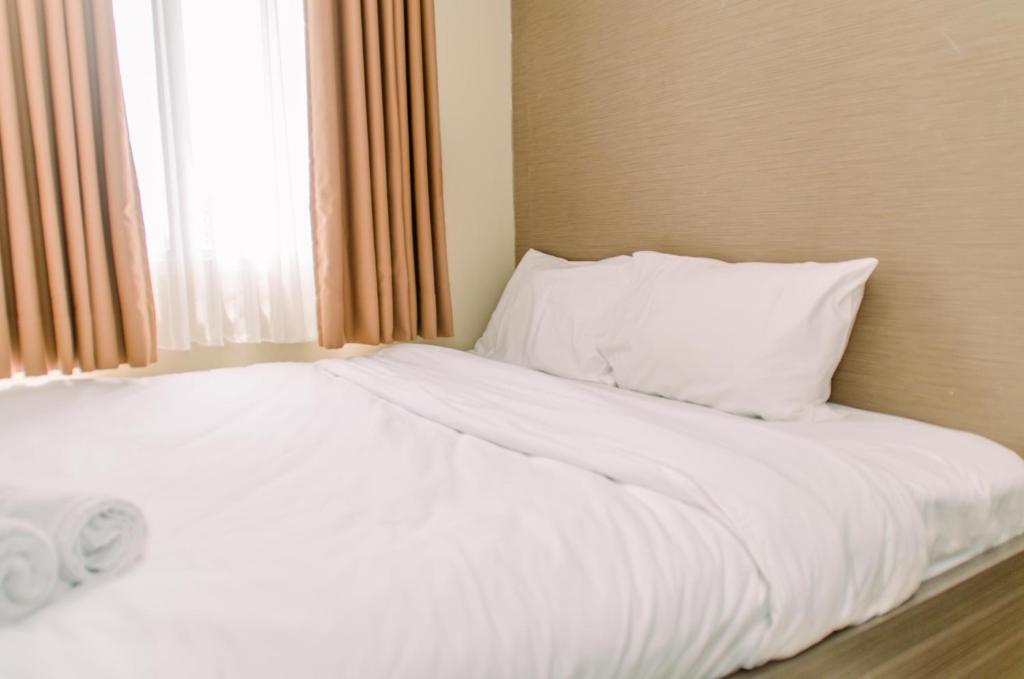 Nice and Elegant 2BR at Serpong Greenview Apartment By Travelio
