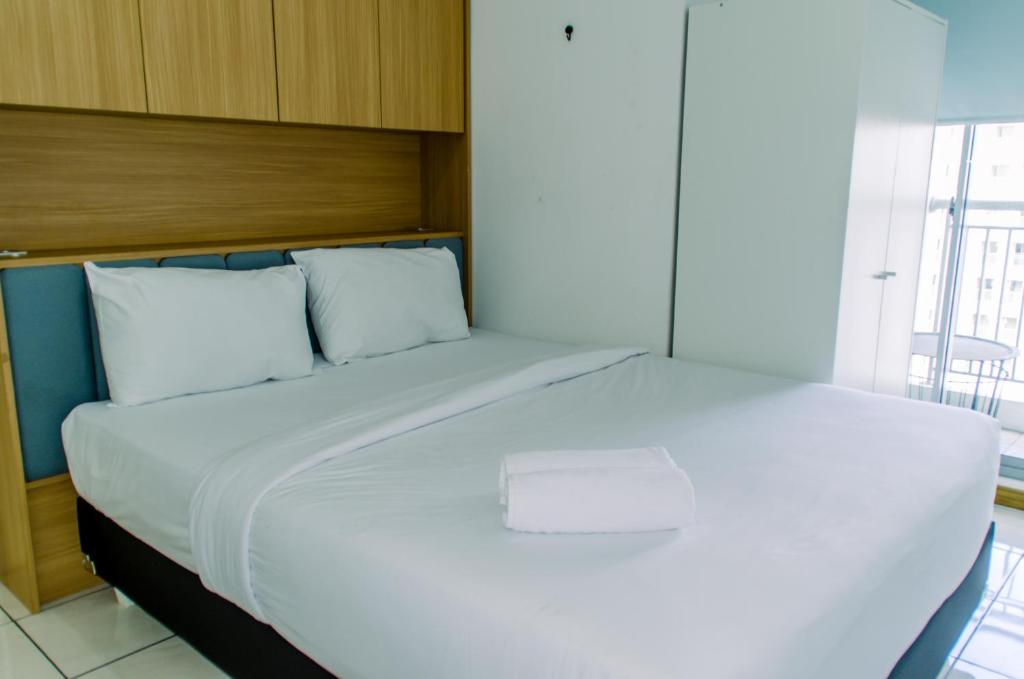 Fancy and Nice 2BR Apartment at M-Town Residence By Travelio