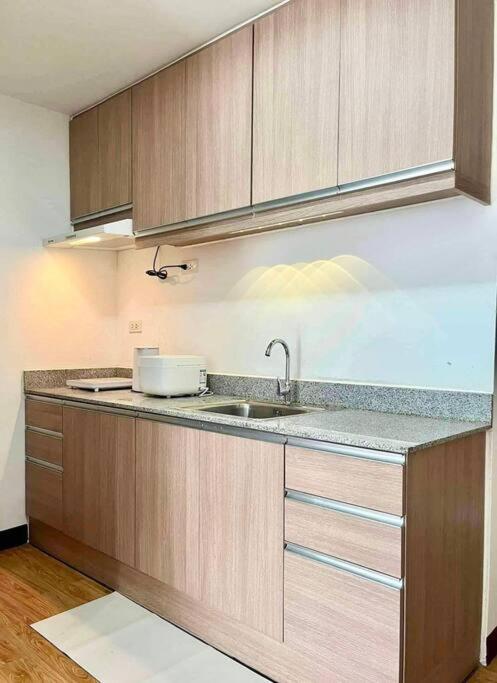 Balay Bahandi Condominiums - Tap to explore photos