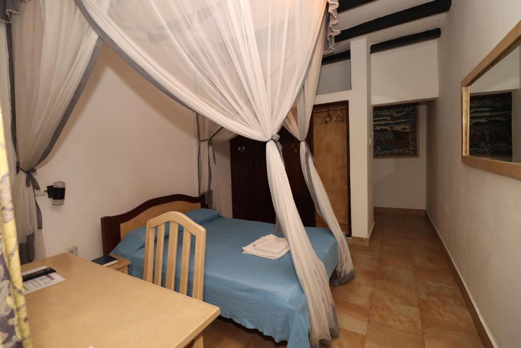 Makuti Villas Resort - Tap to explore photos