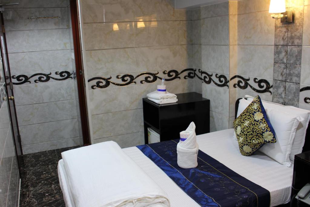 Двухместный (Двухместный номер Делюкс с 2 отдельными кроватями), Hong Kong Premium Guest House