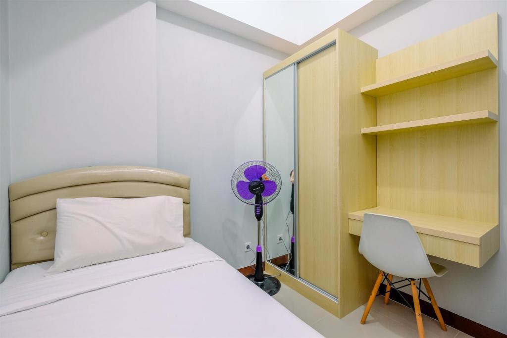 Elegant and Comfort 2BR at Royal Heights Apartment By Travelio photo 1