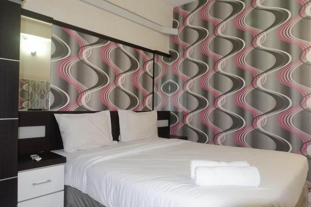 Minimalist 2BR Apartment at Dian Regency By Travelio