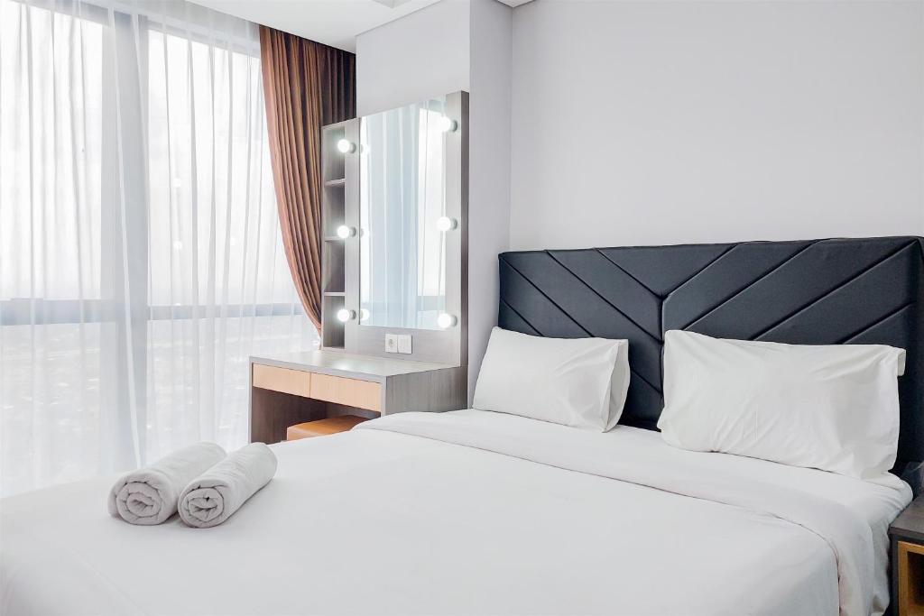 Good and Restful 1BR at The Smith Alam Sutera Apartment By Travelio