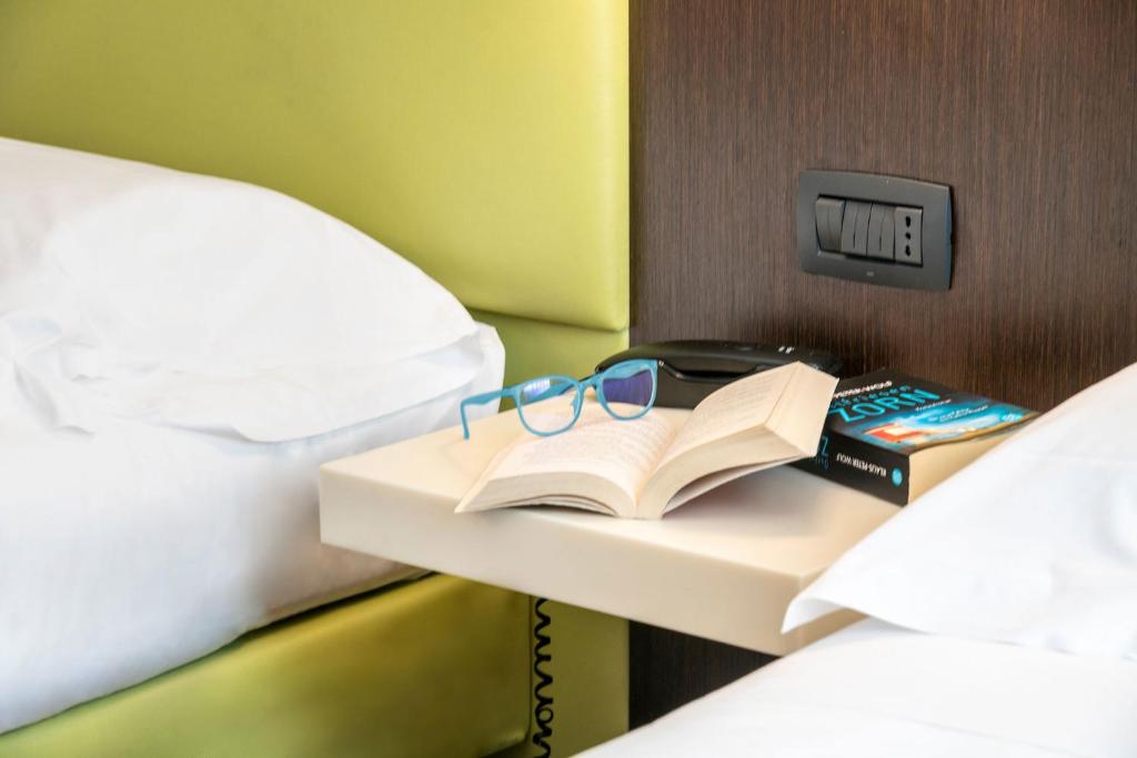 Kona Hotel Verona - Tap to explore photos