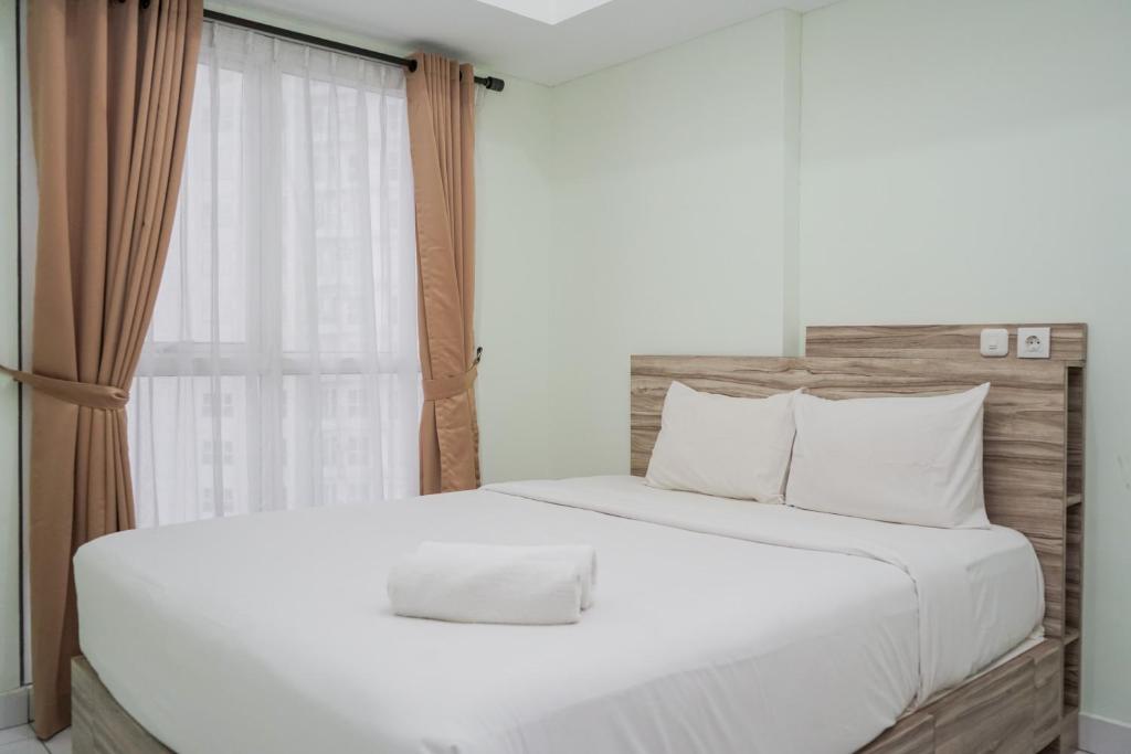 Comfortable 1BR at Casa de Parco Apartment By Travelio