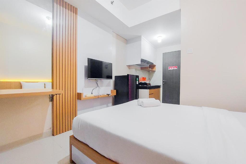 Cozy and Simply Studio at Serpong Garden Apartment By Travelio