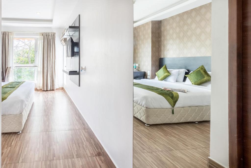 Двухместный ([Sanitized] Standard Double Room), Treebo J'S Five Two Boutique