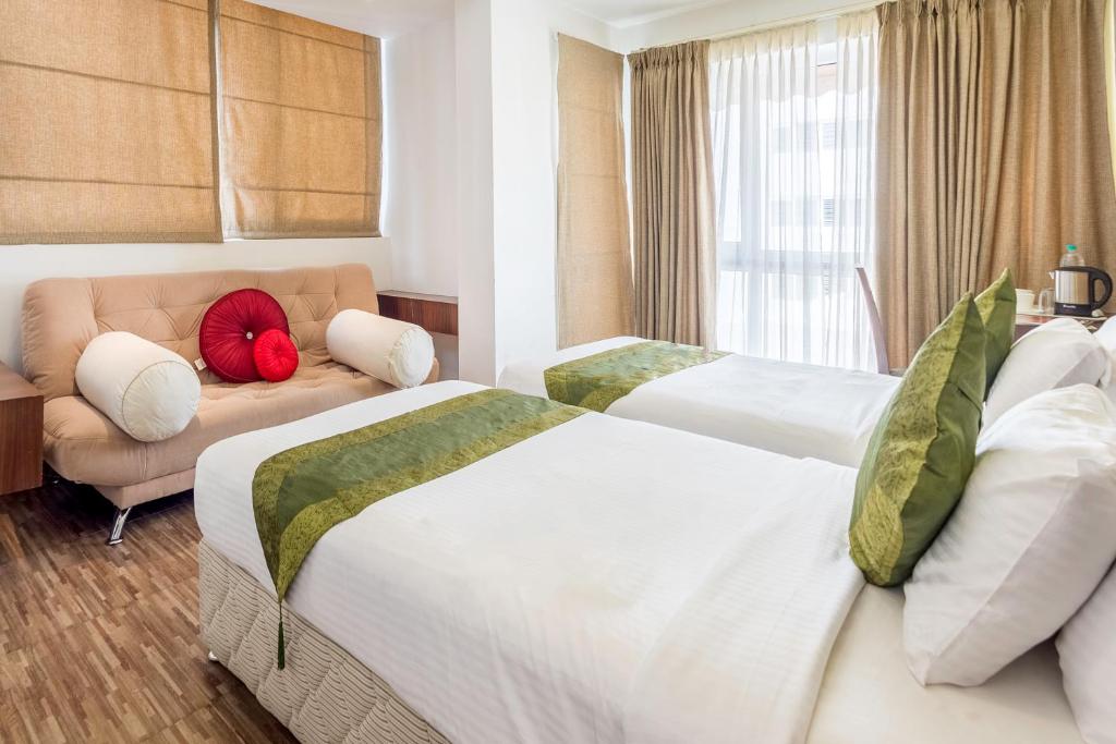 Двухместный ([Sanitized] Deluxe Double Room), Treebo J'S Five Two Boutique