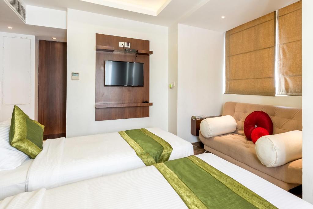 Двухместный ([Sanitized] Deluxe Double Room), Treebo J'S Five Two Boutique