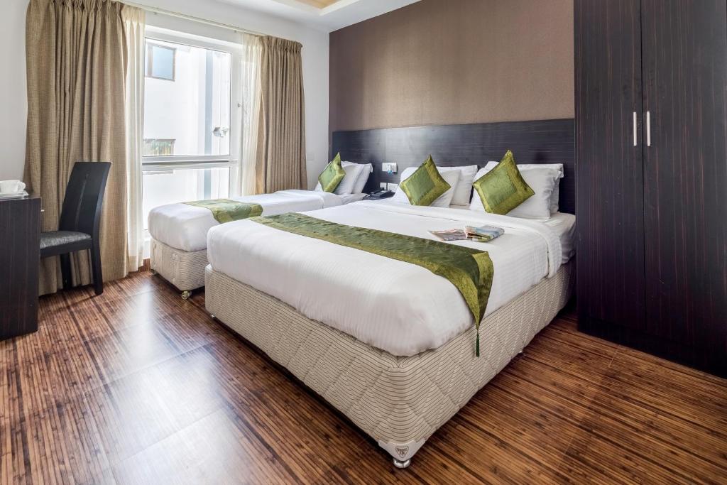 Двухместный ([Sanitized] Deluxe Double Room), Treebo J'S Five Two Boutique