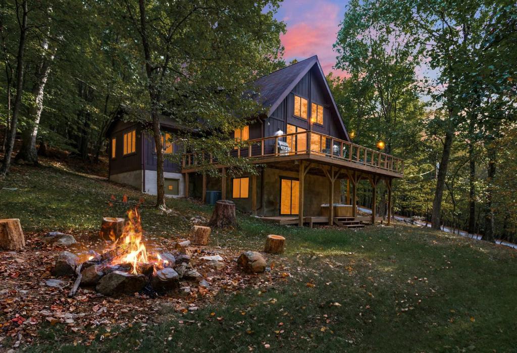 Hot Tub, Private Lake, & Huge Deck at Chalet Cabin image