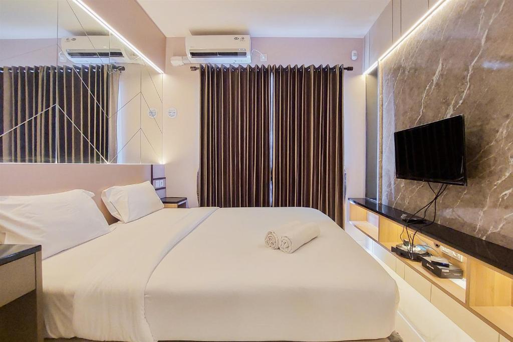Scenic and Restful Studio Sky House BSD Apartment By Travelio