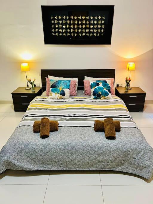 Seaside Spinola APT in St Julians, Queen beds - Tap to explore photos