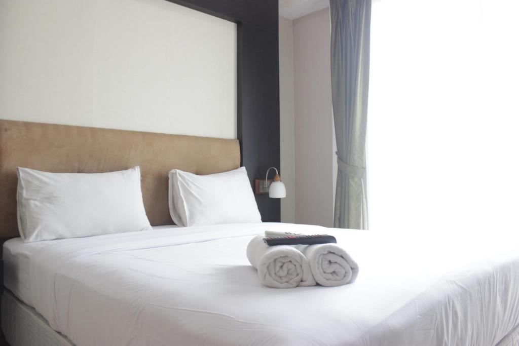 Spacious 1BR Apartment with Great View Marbella Suites Dago Pakar Bandung By Travelio, Bandung