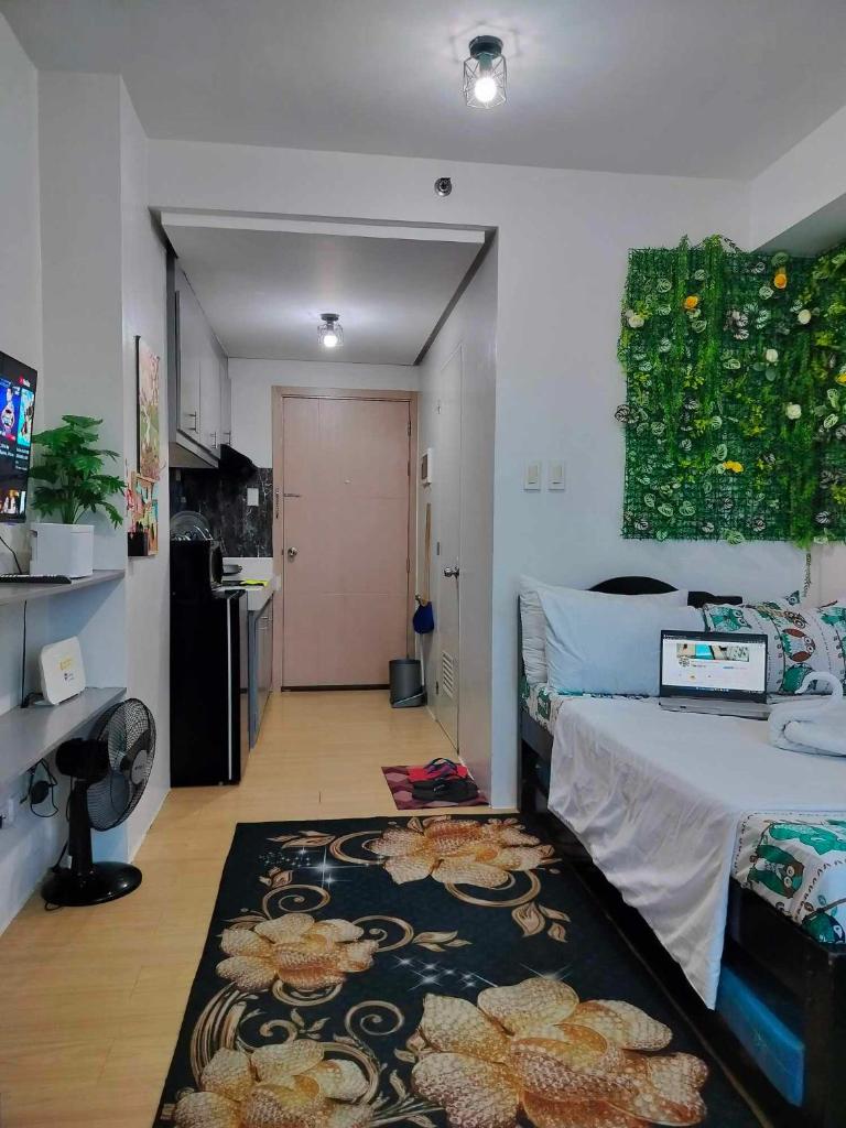 27th Floor Cozy Studio Unit with City View in Mplace, Marilao