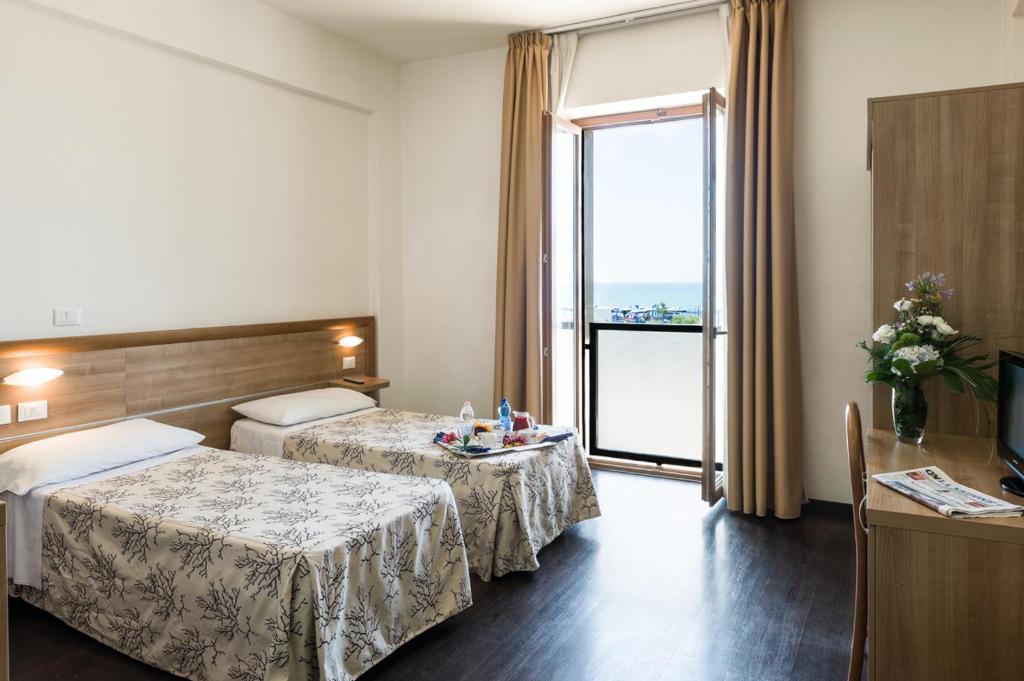 Hotel Rondine - Tap to explore photos