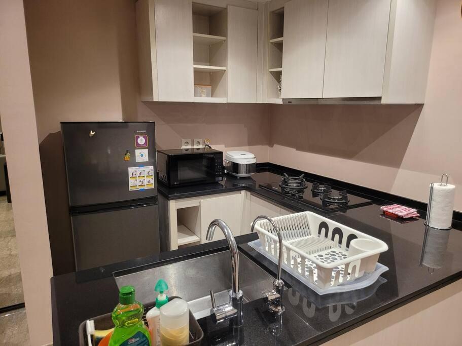 Cozy 2 BR Apartment at Branz BSD photo 3
