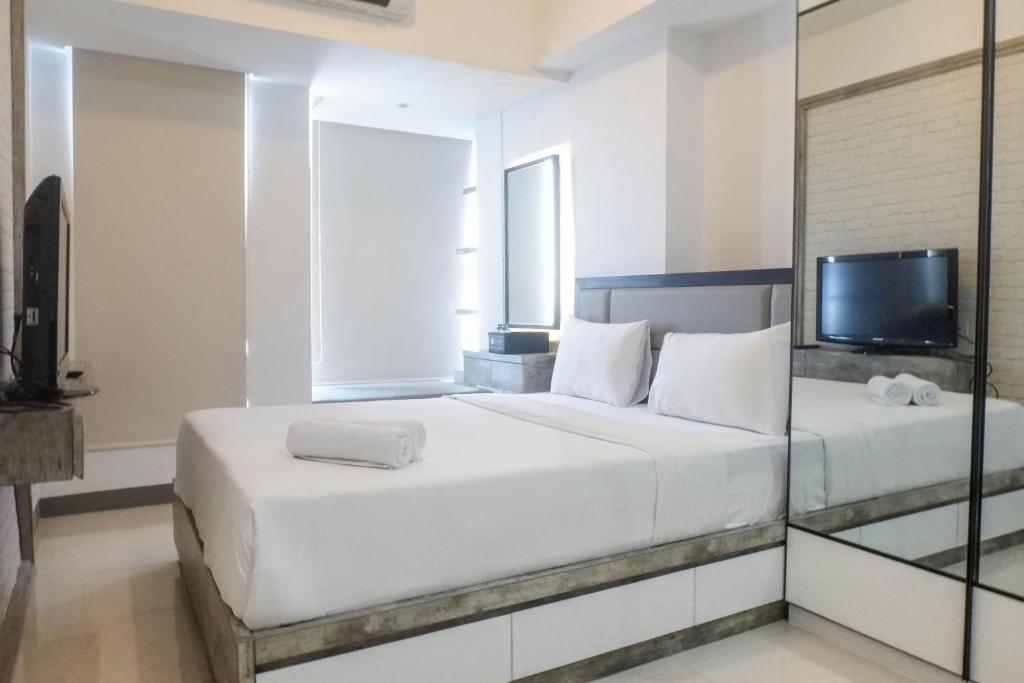 Modern Luxurious Studio Room at Anderson Supermall Mansion Apartment By Travelio