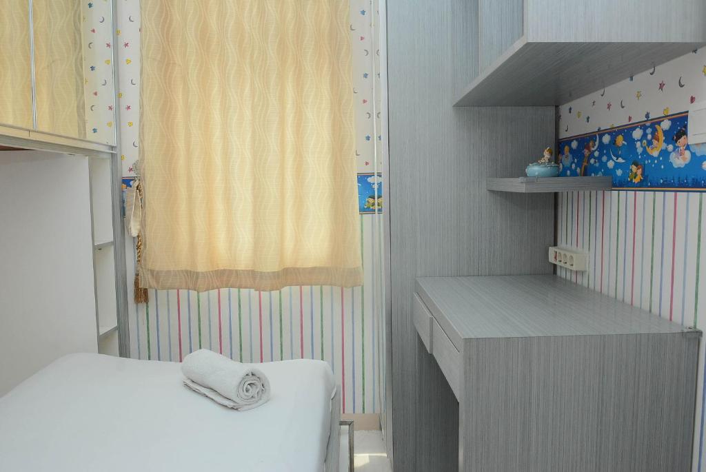 Modern 2BR Apartment Springlake Summarecon Bekasi By Travelio photo 4
