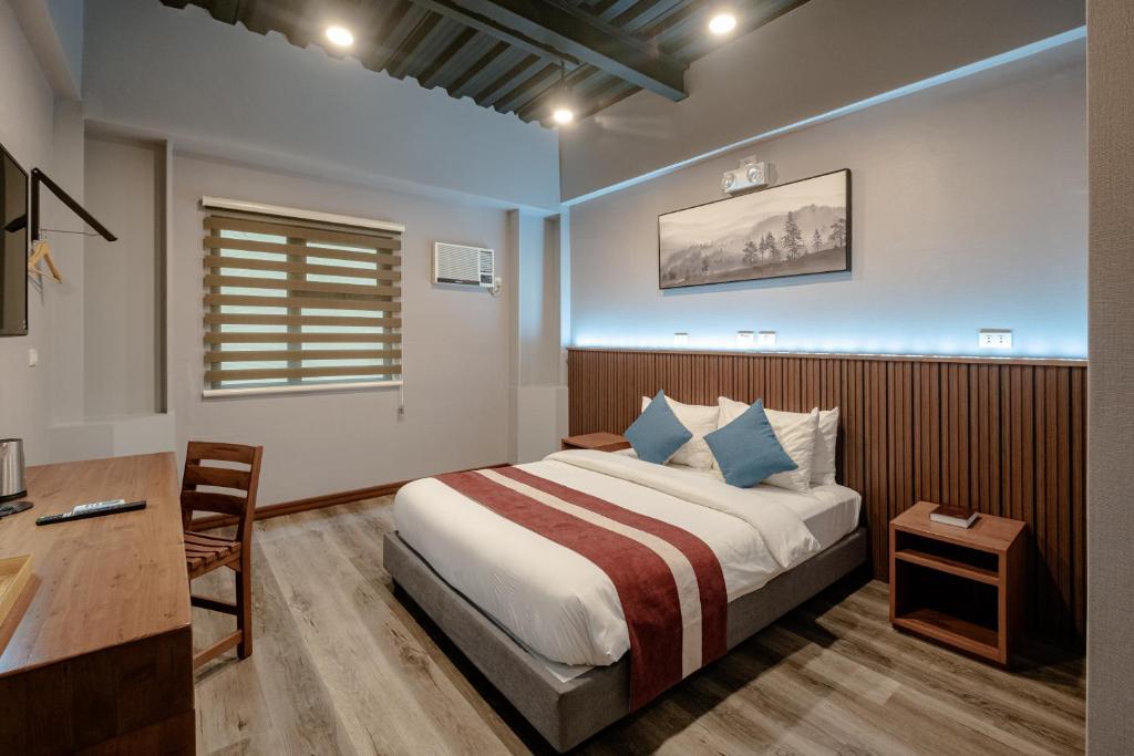 Kekehyu Business Hotel - Tap to explore photos