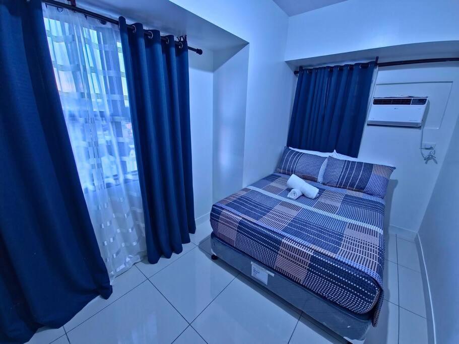 1BR T2 with Balcony Panoramic View at Horizons 101 - Tap to explore photos