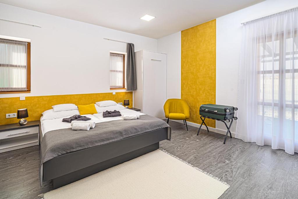 Rigótanya Relax & Wellness Panzió Bükfürdő Room Type - Földszinti extra szoba (3), terasszal Nr.8 Rigótanya Relax & Wellness Panzió Bükfürdő Room Type - Földszinti extra szoba (3), terasszal Nr.8
