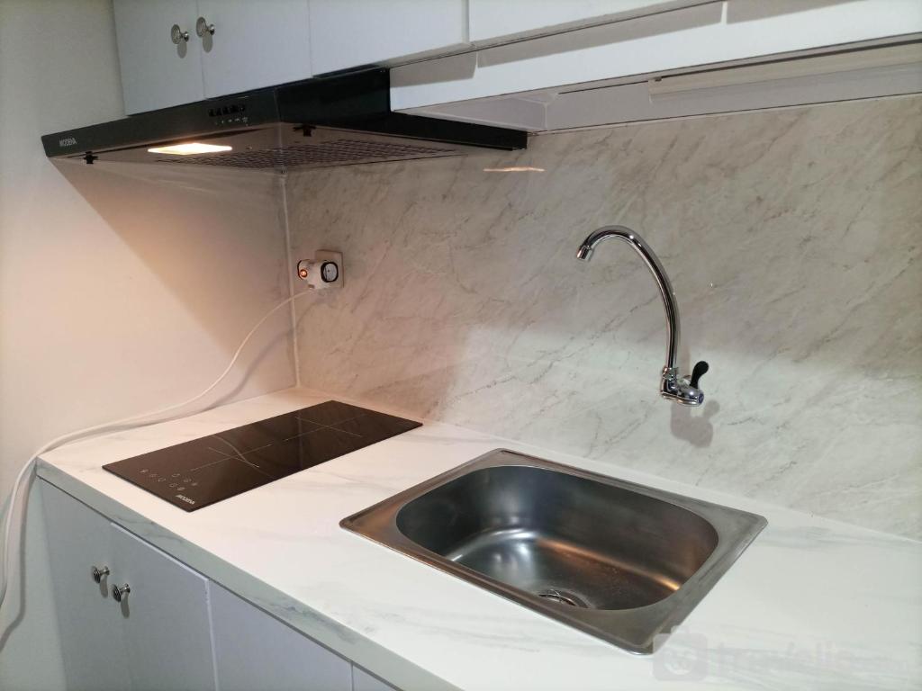 Elegant and Spacious 1BR at Patraland Amarta Apartment By Travelio photo 3