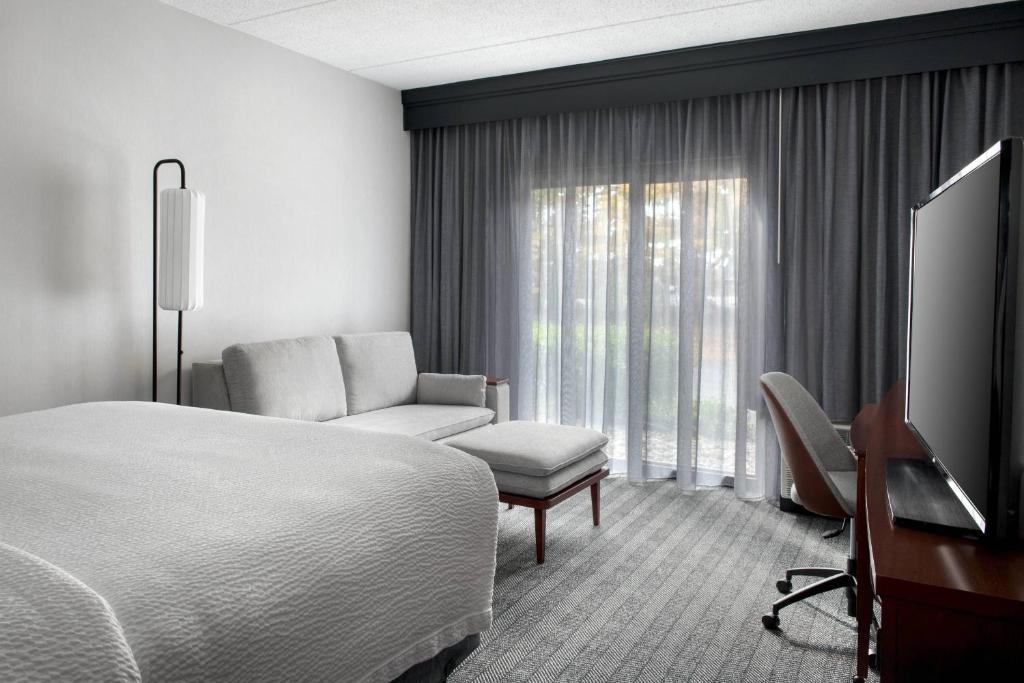 Courtyard by Marriott Poughkeepsie - Tap to explore photos