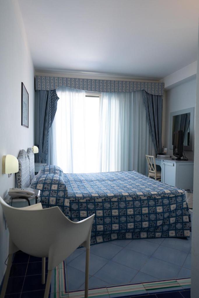 Hotel Santa Caterina - Tap to explore photos