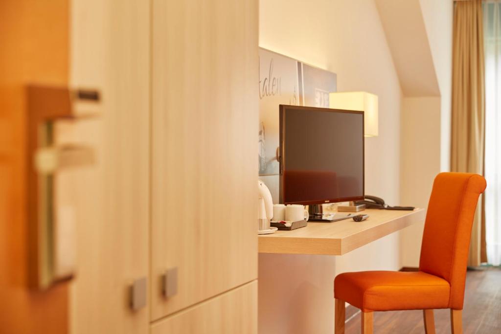 Двухместный (Улучшенный двухместный номер с 1 кроватью), H+ Hotel Limes Thermen Aalen