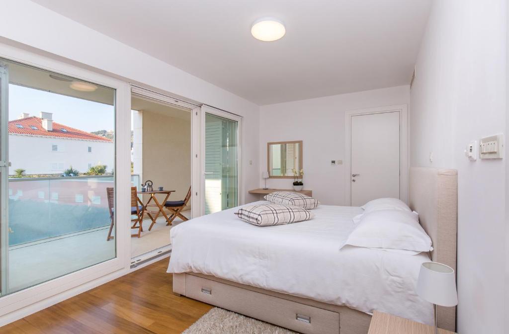 Апартаменты (Апартаменты Делюкс с 1 спальней и террасой, вид на сад), Dubrovnik Luxury Residence – L’Orangerie