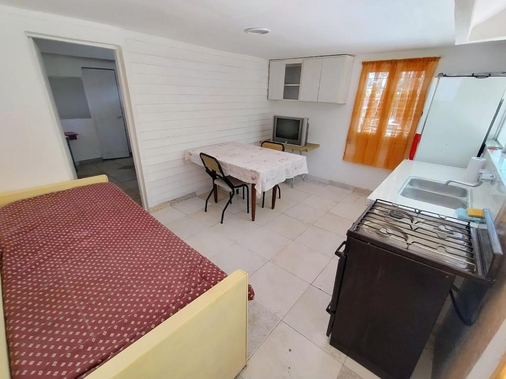 Casa para 3 personas con patio photo 2