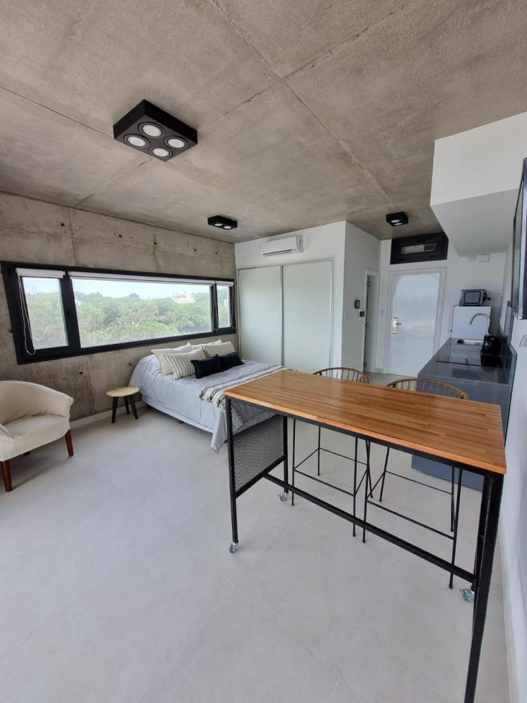 Alquiler De Departamento Monoambiente Con Terraza, Frente Al Mar En La Costa Quequén, Con Pileta, Solarium y Sum Con Parrilla photo 1