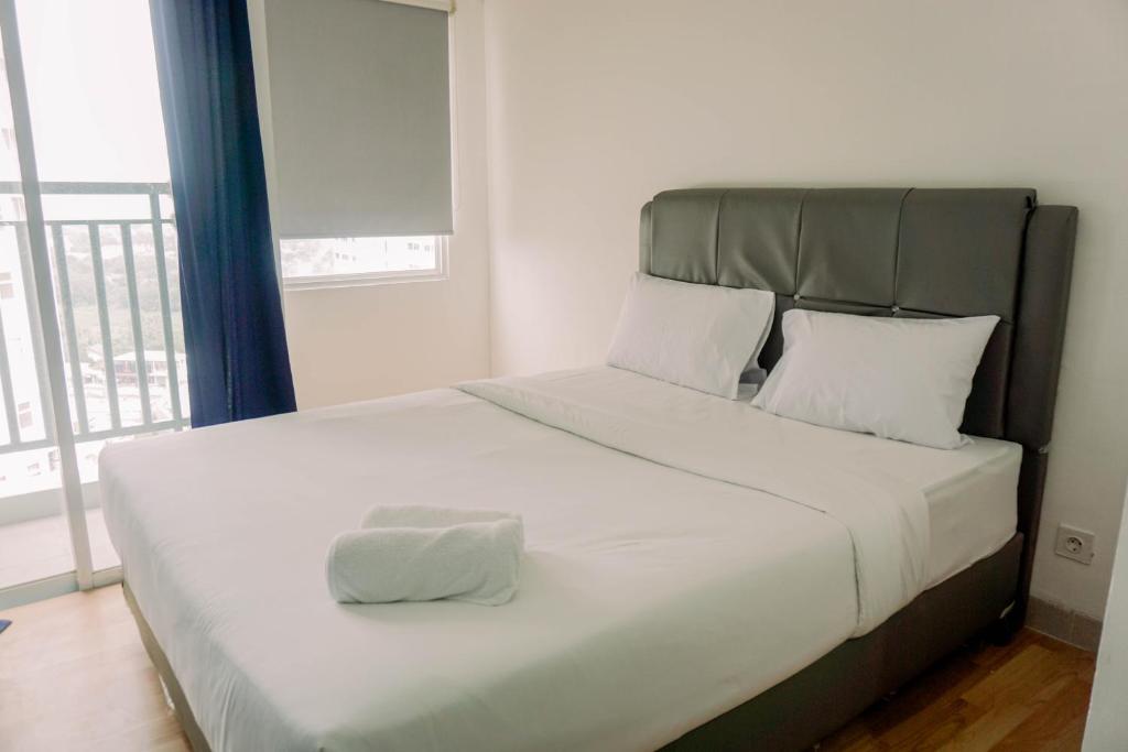 Minimalist and Best Deal Studio at Serpong Garden Apartment By Travelio, Tangerang