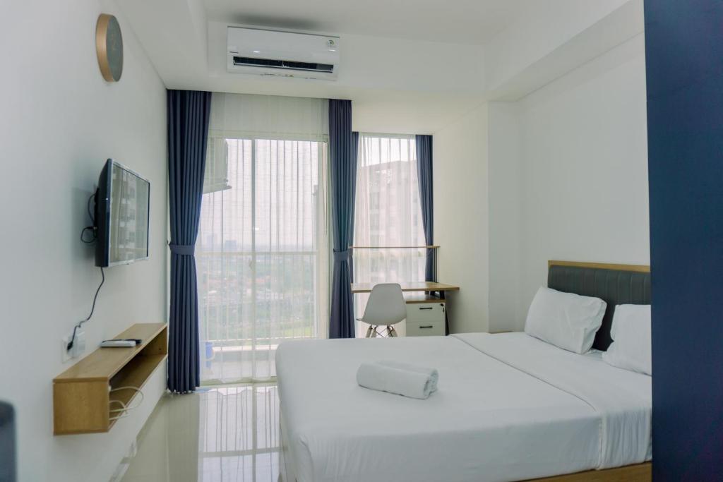 Good Deal and Homey Studio Pacific Garden Apartment By Travelio, Tangerang