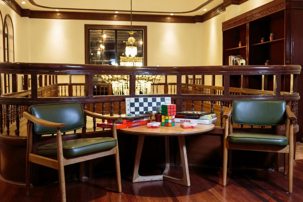 Одноместный (Одноместный номер с общей ванной комнатой), Tambayan Capsule Hostel & Bar