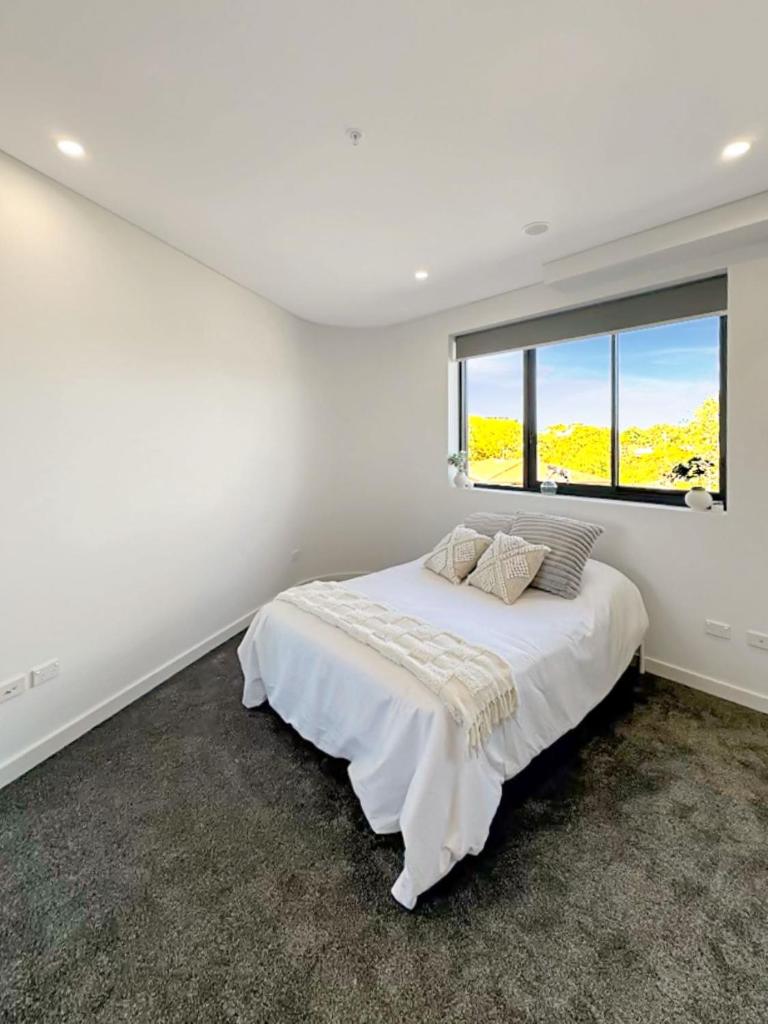 Modern 2BR Suite with Balcony & Parking near Airport photo 2