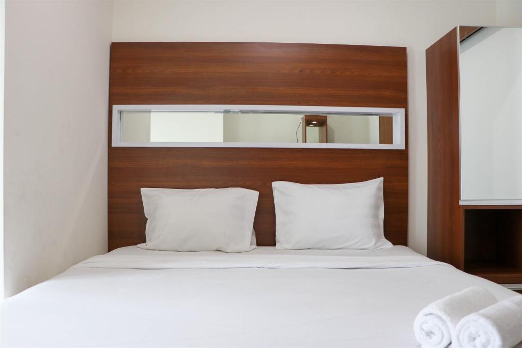 Restful 1BR without Living Room Grand Kamala Lagoon Apartment By Travelio photo 1