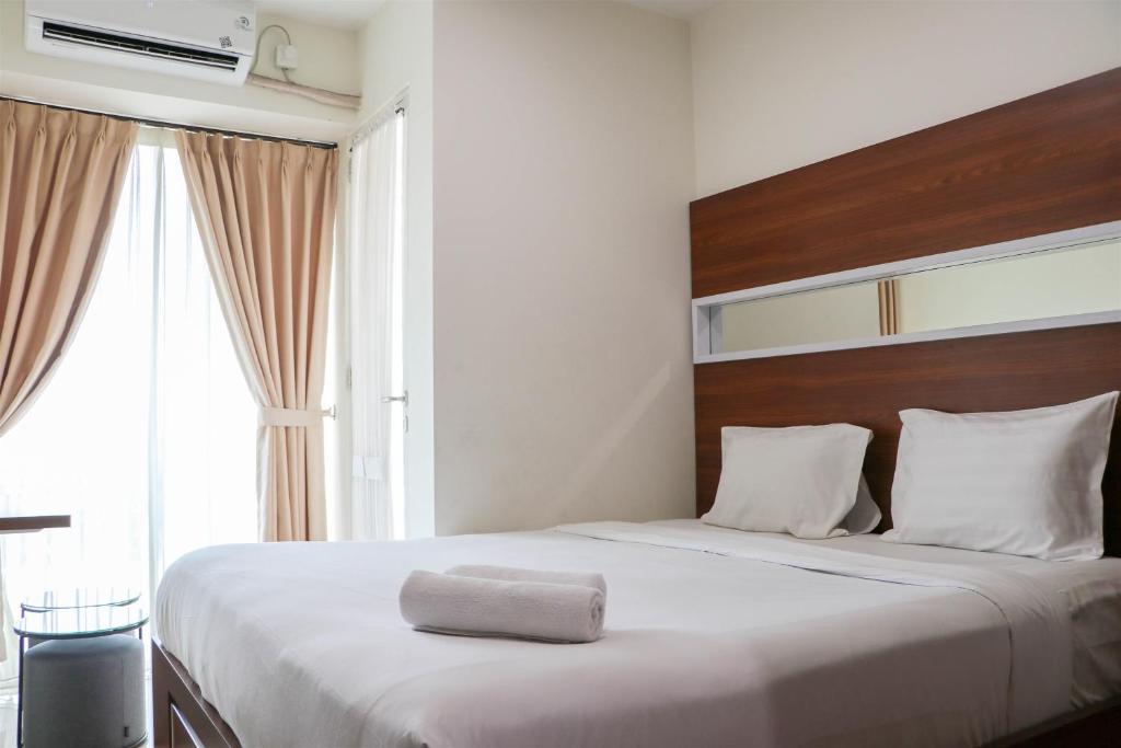Restful 1BR without Living Room Grand Kamala Lagoon Apartment By Travelio