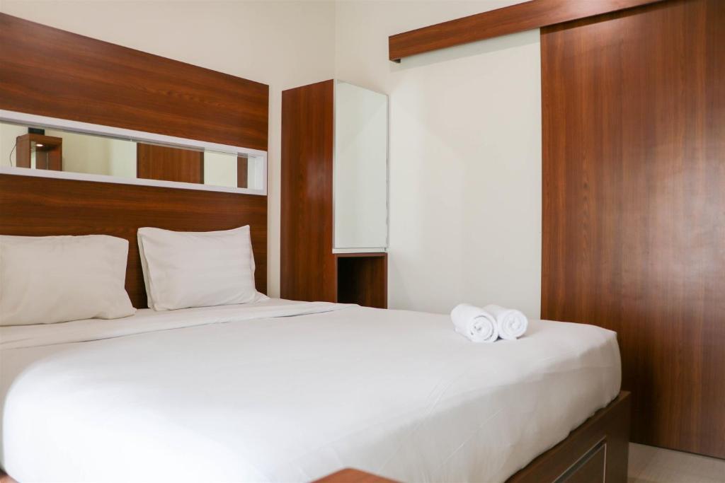 Restful 1BR without Living Room Grand Kamala Lagoon Apartment By Travelio photo 2
