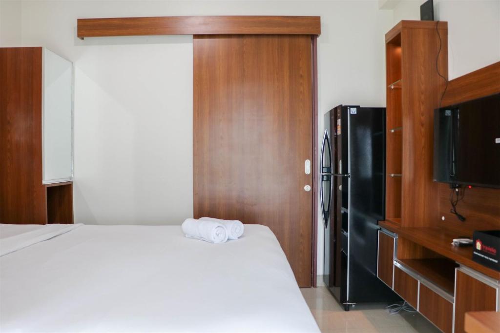 Restful 1BR without Living Room Grand Kamala Lagoon Apartment By Travelio photo 4